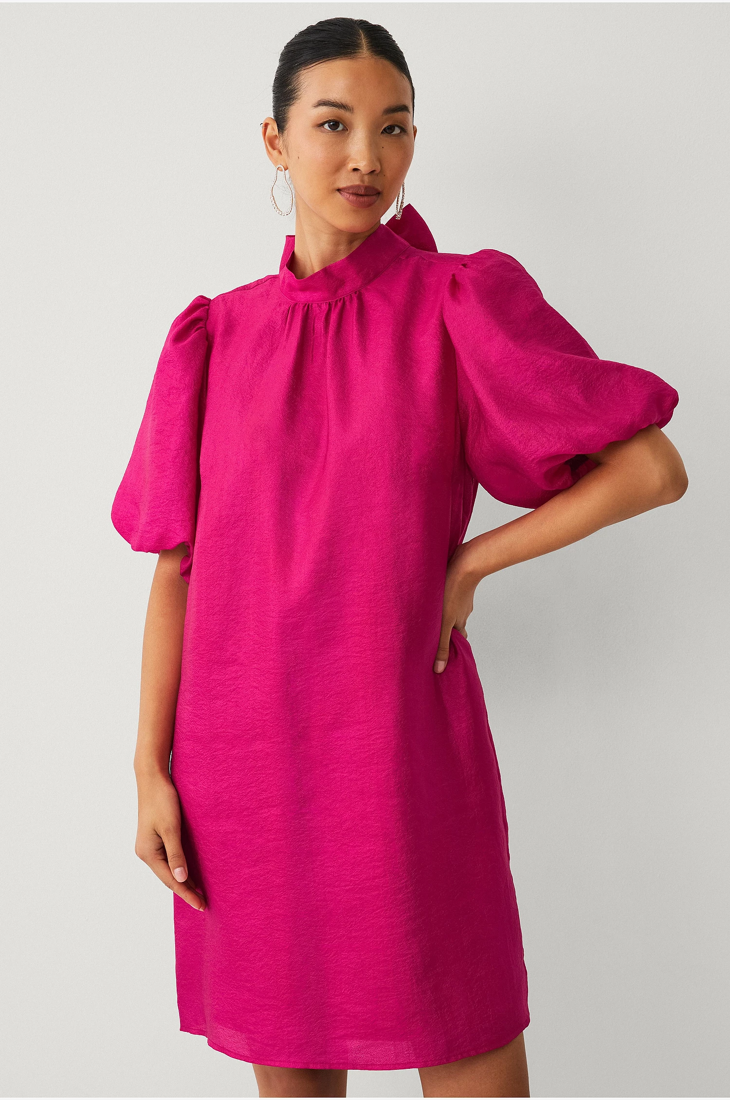 Klänning med rosett